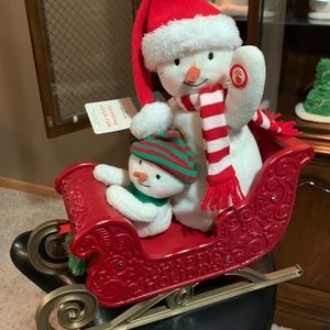 2016 Hallmark Singing snowman on sleigh